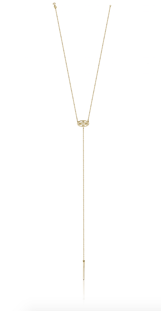 Full length shot of the yellow gold lariat on a white background