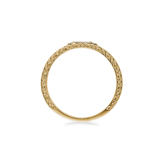 Side view 14k yellow gold band with textured side detail and baguette diamonds on white background.