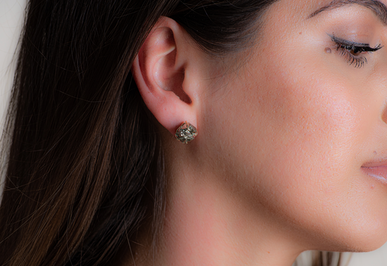 Close up of pyrite studs on a model 